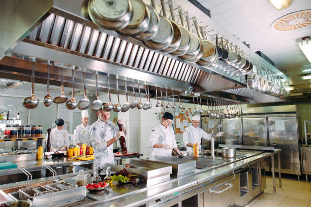 istock Modern kitchen. The chefs prepare meals in the restaurant's kitchen 1271539819