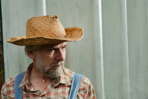 istock Middle-aged worker in dungarees 1271542715