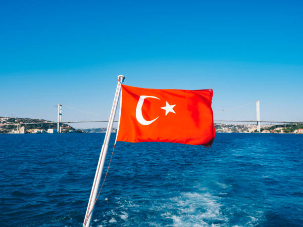 istock Turkish flag on ship with the background of Istanbul Bosphorus 1271545127