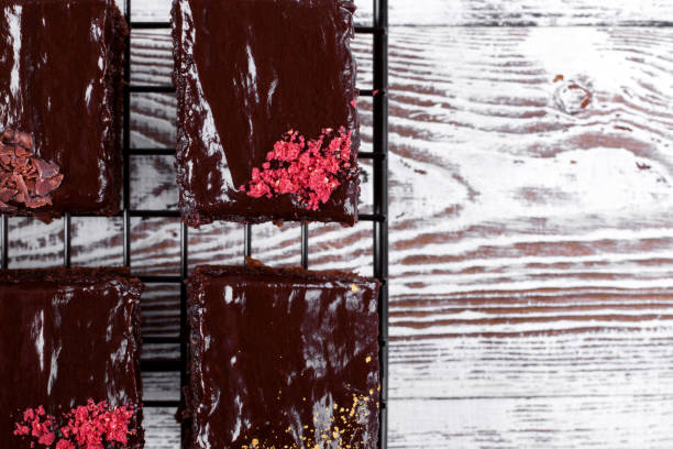 istock Set of brownie cakes with ganache and assorted toppings 1271547402