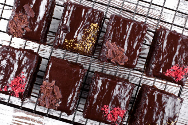 istock Set of brownie cakes with ganache and assorted toppings 1271547421