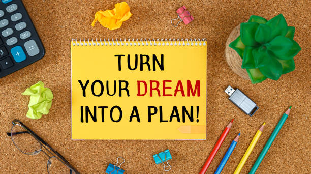 Turn your Dream into a Plan. Inspirational motivating quote stock photo