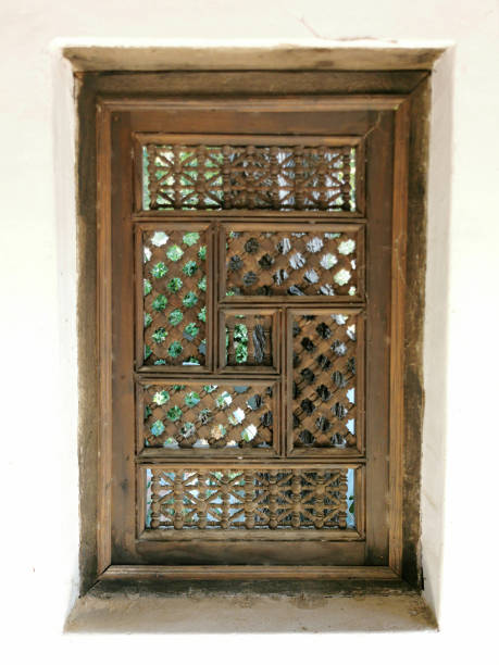 istock decorative wooden window Arabian style with light from behind 1271550351