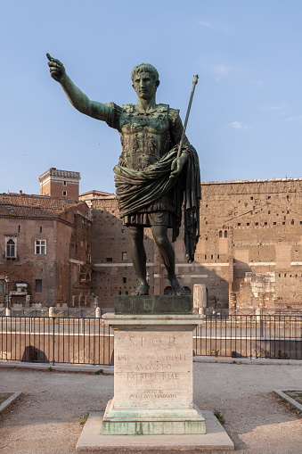 Rome, Italy - June 27, 2010: Famous bronze reproduction of the statue of Trajan, in the Trajan Forum, Rome.
