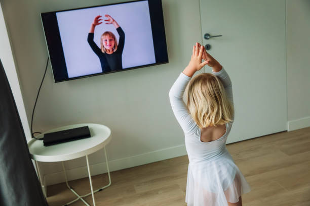 istock Ballet or gymastics lesson online. Remote learning for kids. 1271551669