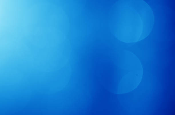 glitter light sparkle blue gorgeous bokeh defocused abstract background shiny.