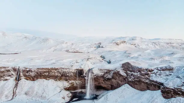 Aerial view of Seljalandsfoss waterfall in winter Iceland