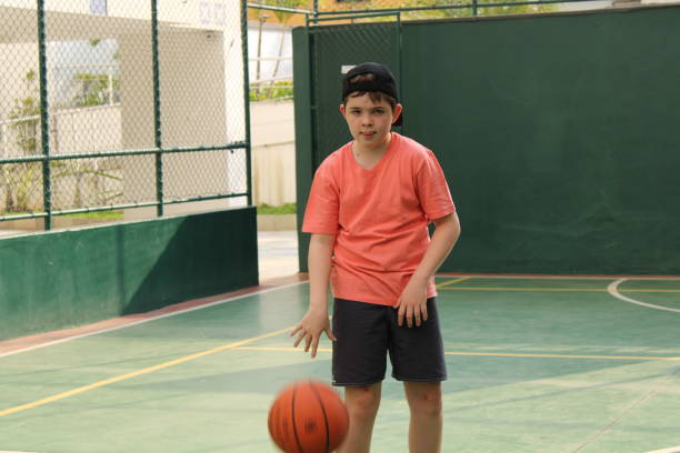 istock boy playing basketball 1271555275