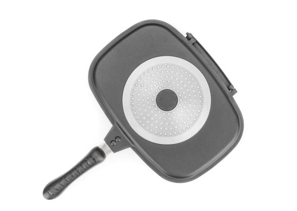 istock Double frying pan with non-stick multi usage isolated on white background. View from above 1271555642