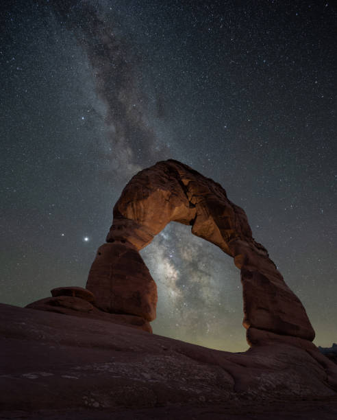 istock Milky Way Galaxy behind a Delicate Arch in Moab Utah 1271556772