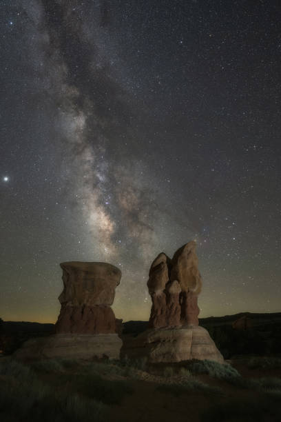 istock Milky Way Galaxy behind hoodoos in Devils Garden Escalante Utah 1271556935