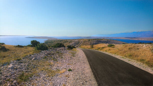 istock Winding road to hidden beach 1271561442