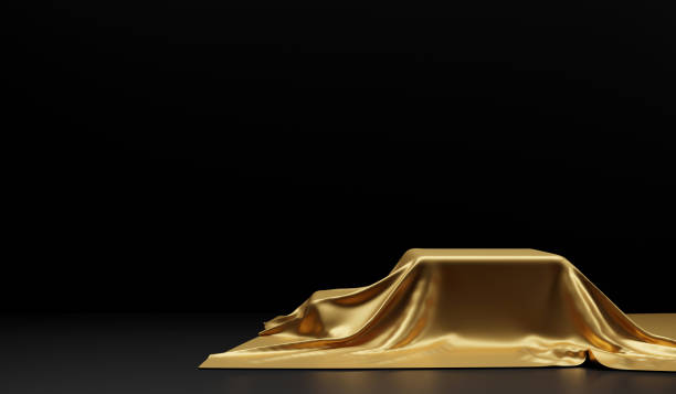 istock Empty podium covered with gold cloth on black background 3d render 1271561473