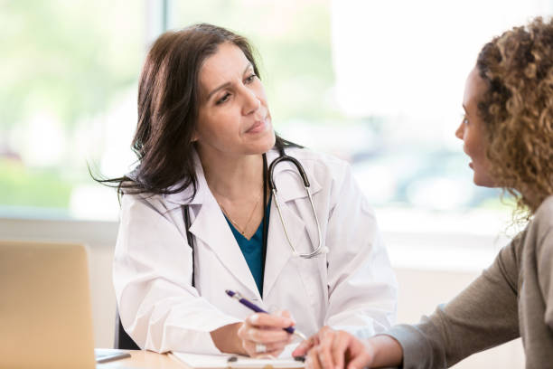 istock Attentive doctor listens to patient 1271564790