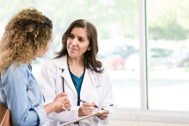 istock Doctor discusses patient's test results 1271564907