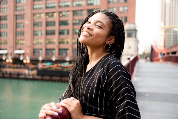 istock Young woman laughing and looking at camera 1271565033