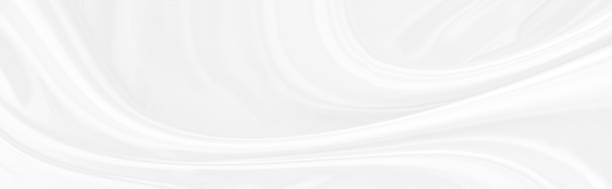 istock White gray satin texture that is white silver fabric silk panoramic background with beautiful soft blur pattern natural. 1271566349
