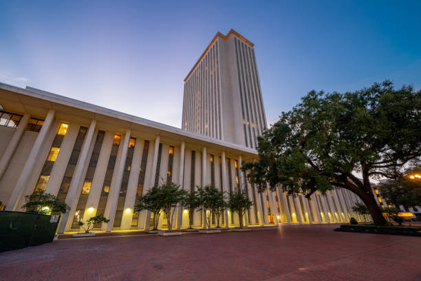 Architecture Tallahassee FL Florida State Capitol Building at twilight Architecture Tallahassee FL Florida State Capitol Building at twilight support usa florida politics stock pictures, royalty-free photos & images