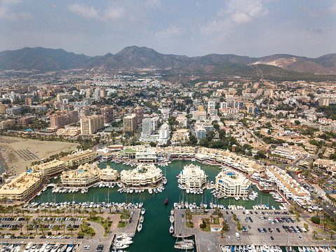 Aerial View of Puerto Mariana, from Benalmadena, popular touristic attraction in South of Spain , Malaga
