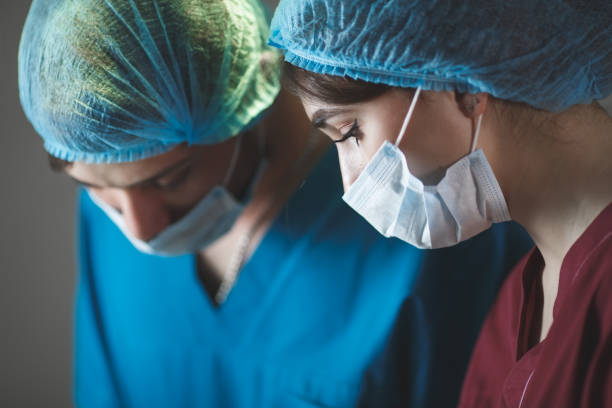 istock Portrait of surgeons at work, operating in uniform. 1271568622