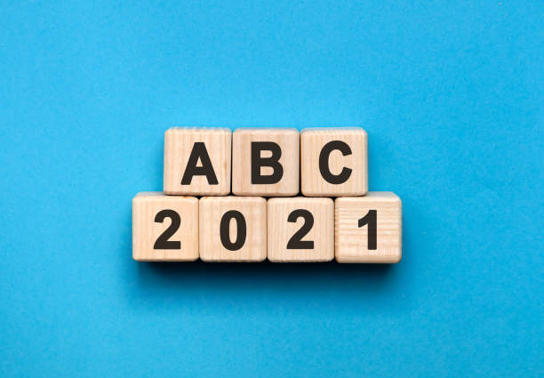 istock ABC - text concept on wooden cubes with gradient blue background 1271571167