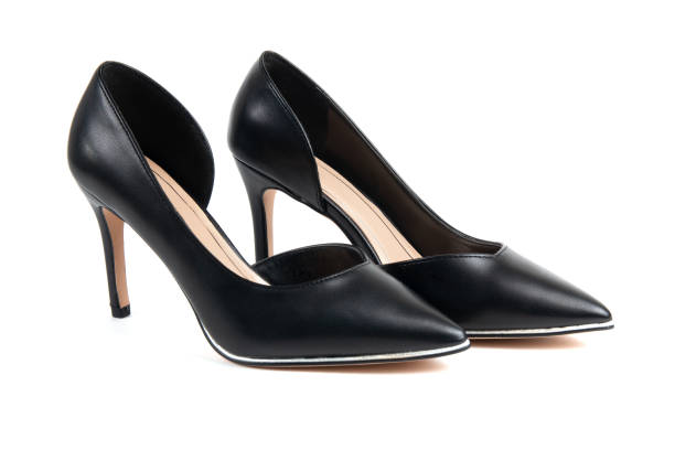 istock Women black classic shoes on a white background 1271574341