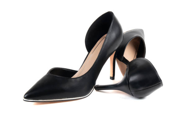 istock Women's black classic shoes on a white background 1271574365