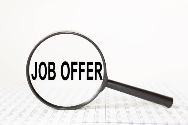 istock words in a magnifying glass on a white background. business concept 1271575306