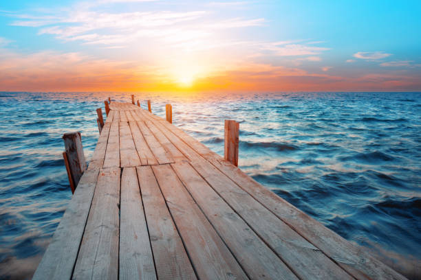 The pier leaving at sea at dawn