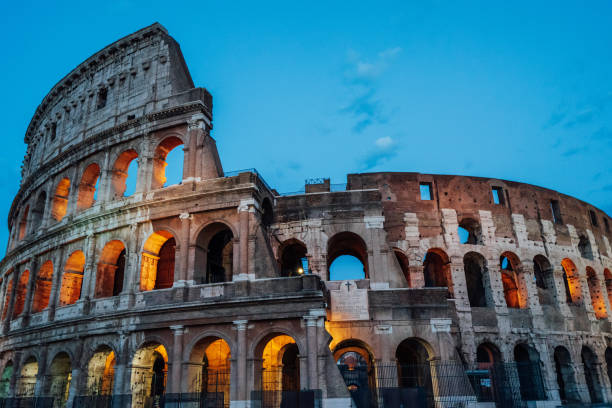 istock Colosseum in Rome at night with lights on 1271579748