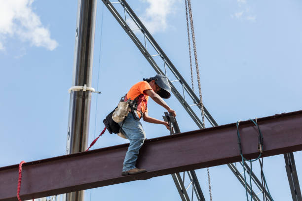 istock Ironworker at construction site installing roof joist 1271581364