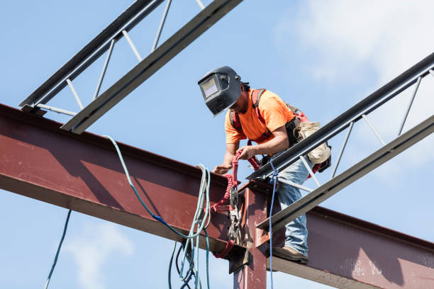 istock Ironworker at construction site installing roof joist 1271582385