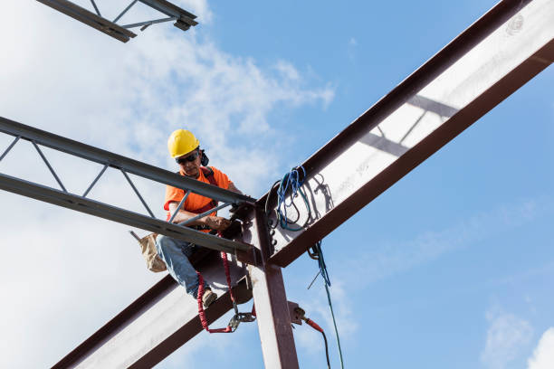 istock Ironworker at construction site installing roof joist 1271582511