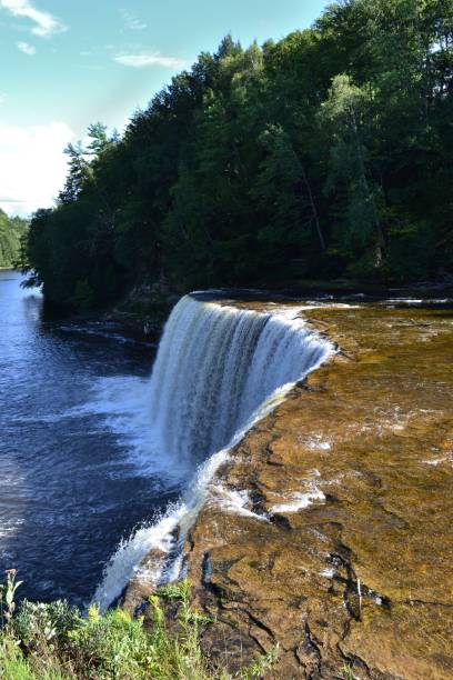 istock Vertical View of Upper Tahquamenon Falls 1271585308