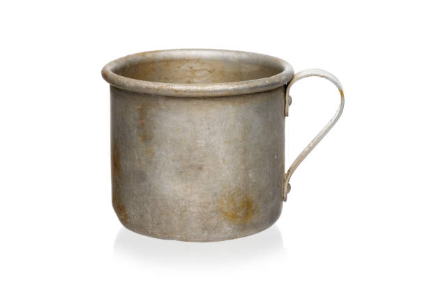 istock Vintage aluminum mug isolated on white background. 1271585758