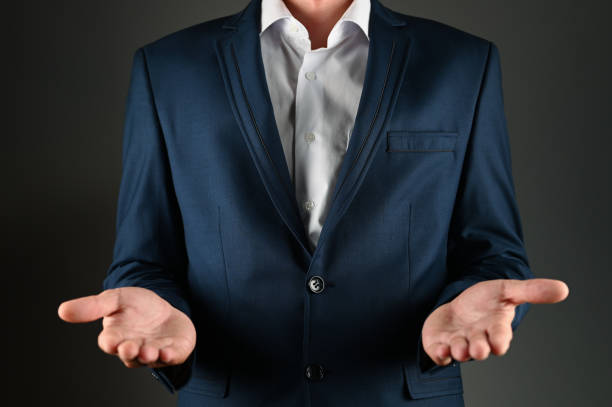 istock The man in the suit stretches his palms forward 1271587514
