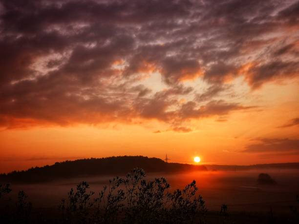 istock Colorful sunrise with ground fog 1271589878