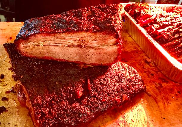 istock Cherry Wood Hand Rubbed Slow Smoked Beef Brisket 1271595948