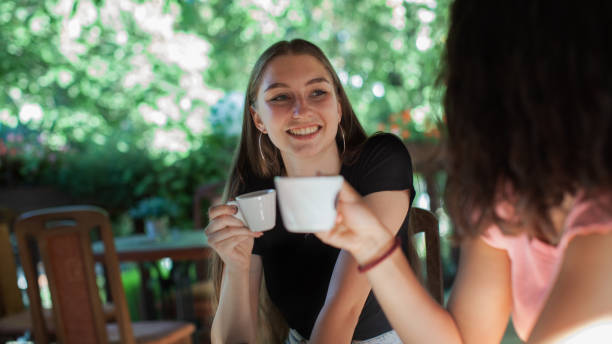 istock Women having fun during coffee time in a coffee shop 1271596793