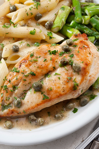 Grilled Chicken Piccata with Penne Pasta, Asparagus and Fresh Artisan Bread