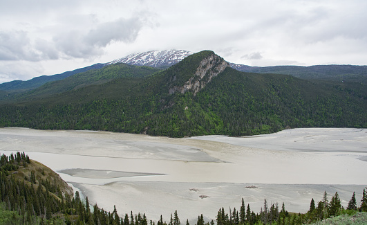 Huge glacier path with a river in Eastern Alaska