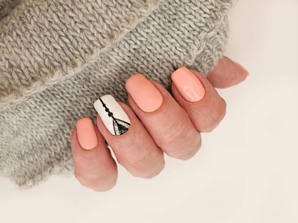istock female hand beautiful elegant manicure sweater 1271602342