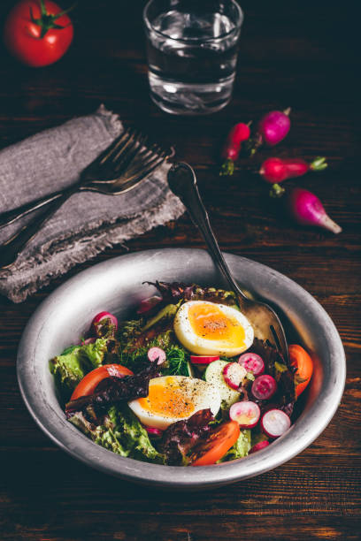 istock Fresh spring salad with homegrown vegetables and boiled eggs 1271608879