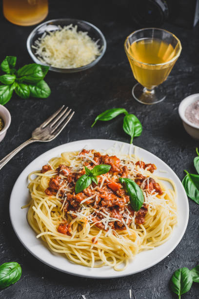 istock Spaghetti with bolognese sauce, parmesan and basil 1271609025