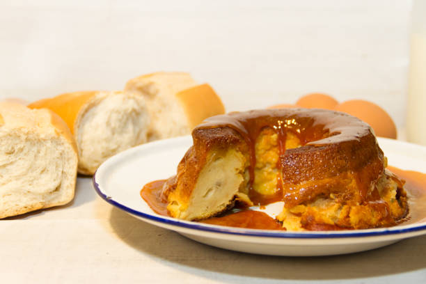 istock bread pudding made with stale bread, milk, eggs and sugar, decorated with liquid caramel and dulce de leche 1271616674
