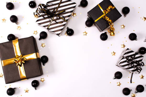 istock Christmas background with decorations and gift boxes on the gray textured board 1271625187
