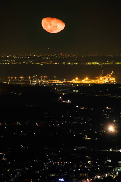 istock Blood moon rise over city 1271630551