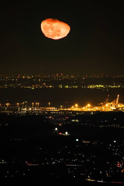 istock Blood moon rise over city 1271630566