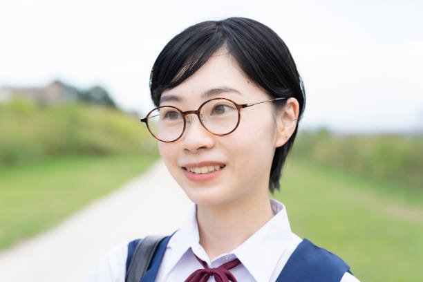 istock Asian high school girls wearing uniforms 1271636313