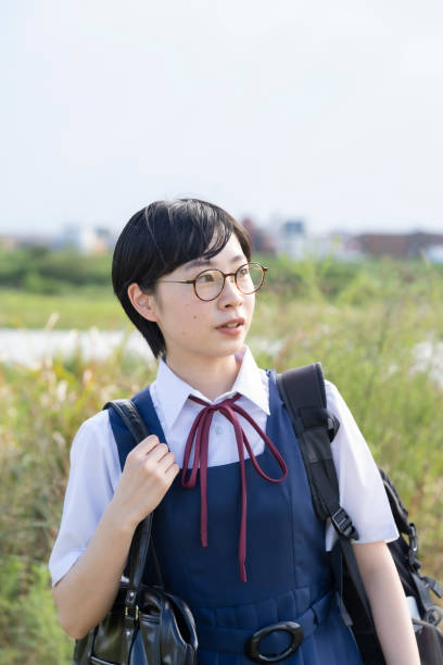 istock Asian high school girls wearing uniforms 1271636930